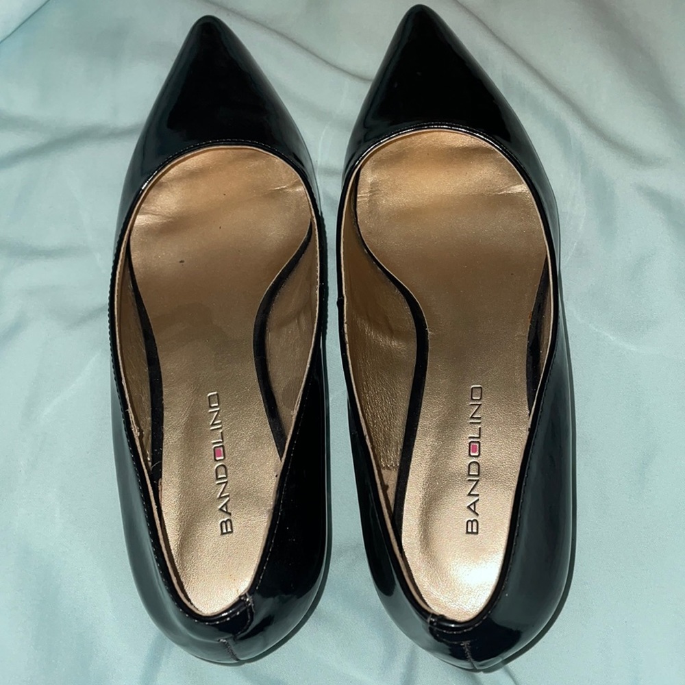 Size 7M Bandolino Bdyara black patent leather wedge. Never worn.